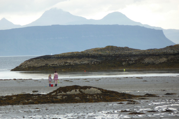 A view over Eigg and Rum from the beach at Samalaman near Glenuig